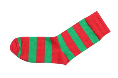 Photo of New striped sock on white background, top view
