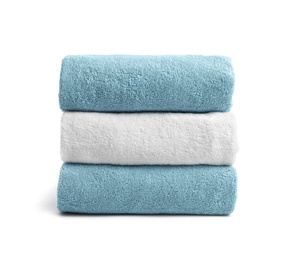 Photo of Stack of clean soft towels on white background