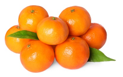 Photo of Fresh ripe tangerines and green leaves isolated on white