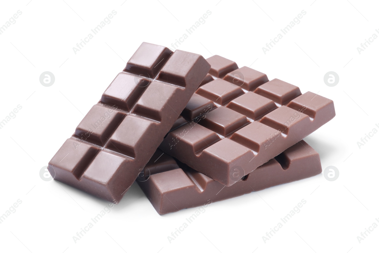 Photo of Delicious milk chocolate bars isolated on white