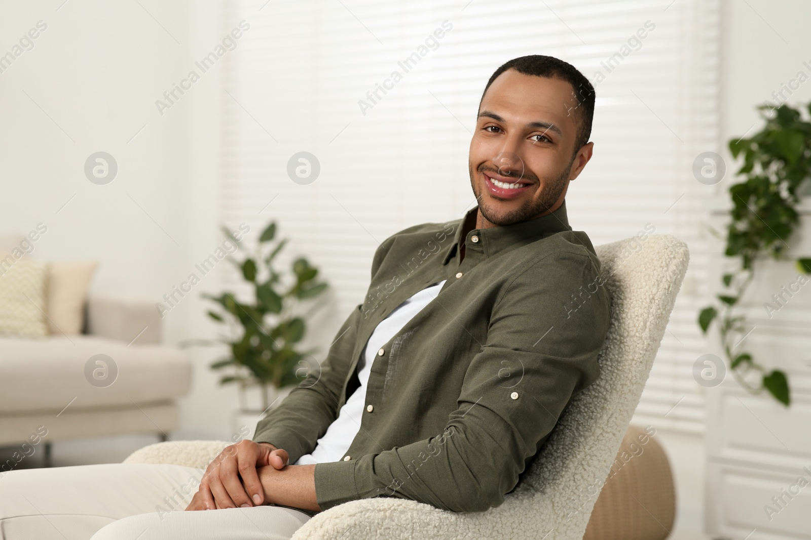 Photo of Portrait of handsome young man at home