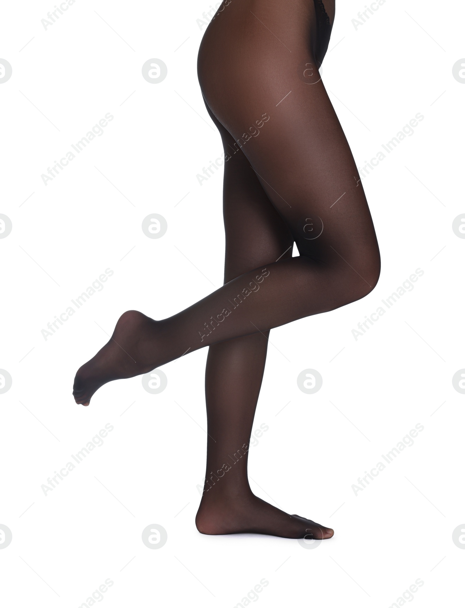 Photo of Woman with beautiful long legs wearing black tights on white background, closeup