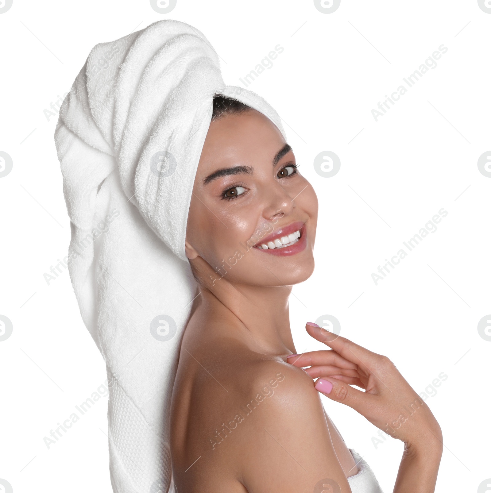 Photo of Beautiful young woman with towels on white background