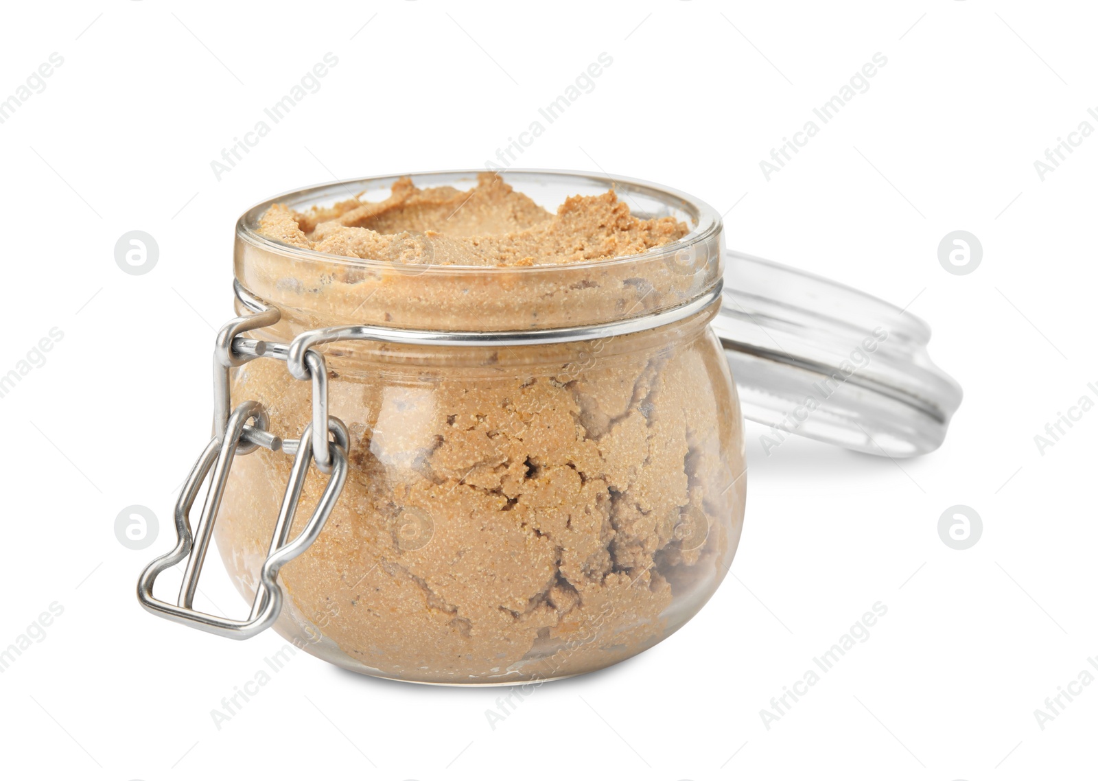 Photo of Delicious meat pate in glass jar isolated on white