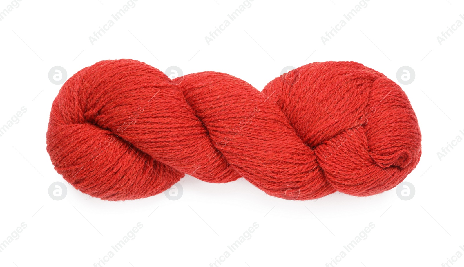 Photo of Red woolen yarn isolated on white, top view