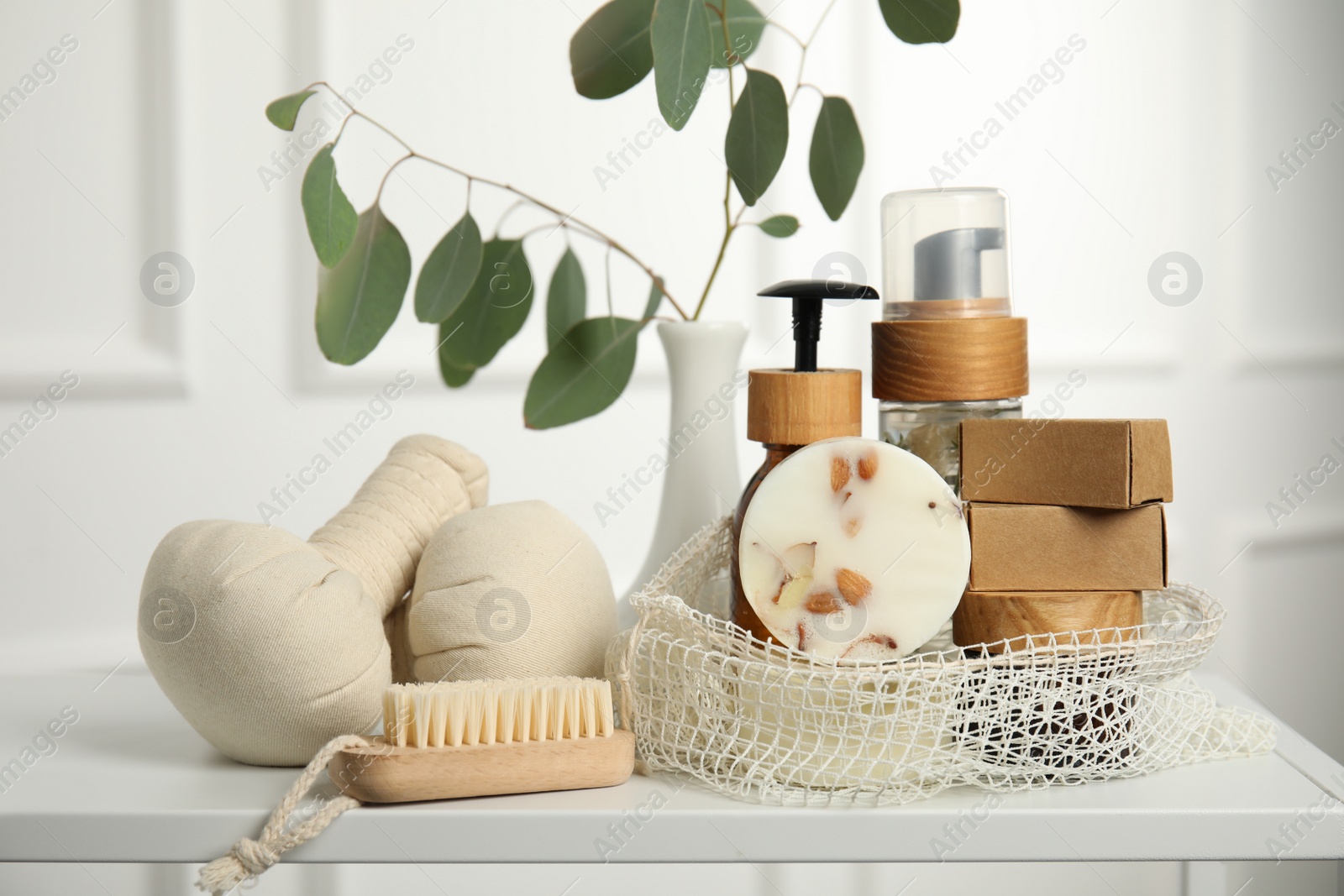 Photo of Eco friendly personal care products on white table indoors