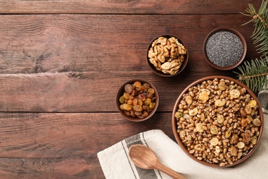 Traditional Christmas slavic dish kutia served on wooden table, flat lay. Space for text