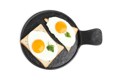 Photo of Tasty fried eggs with bread and parsley isolated on white, top view