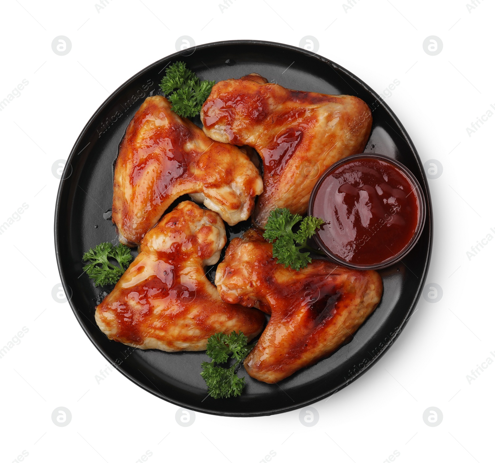 Photo of Plate with marinade and chicken wings isolated on white, top view