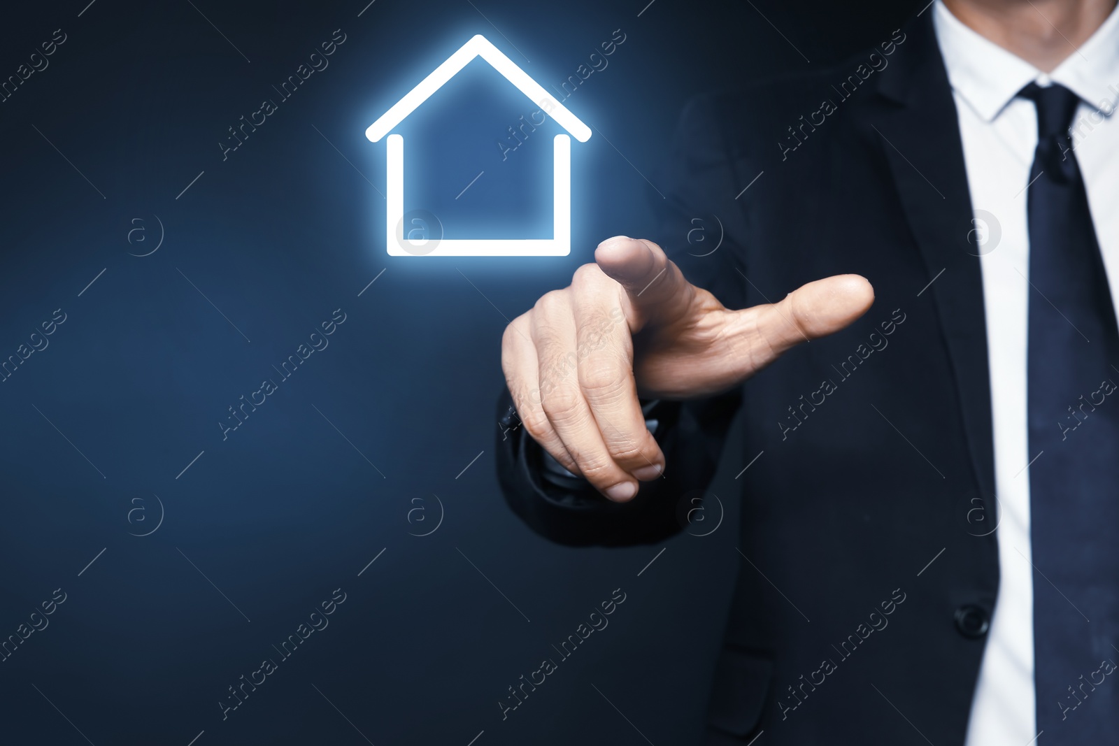 Image of Property insurance concept. Man using virtual screen with house image, closeup