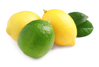 Photo of Fresh lemons, lime and green leaves on white background