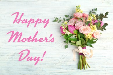 Image of Happy Mother's Day. Bouquet of beautiful flowers on white wooden background, top view