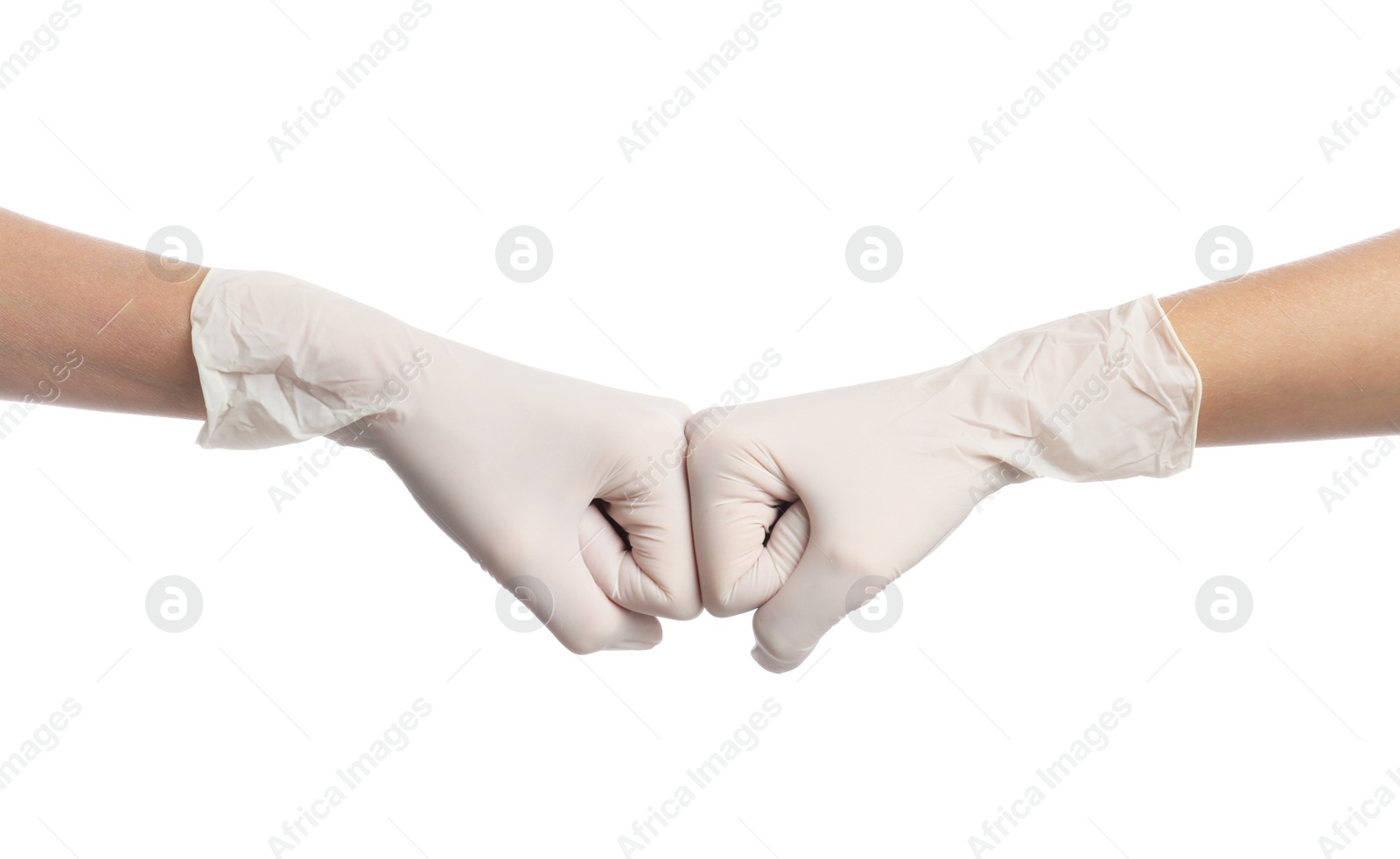 Photo of Doctors in medical gloves making fist bump on white background, closeup