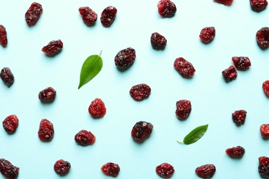 Photo of Flat lay composition of cranberries on color background. Dried fruit as healthy snack