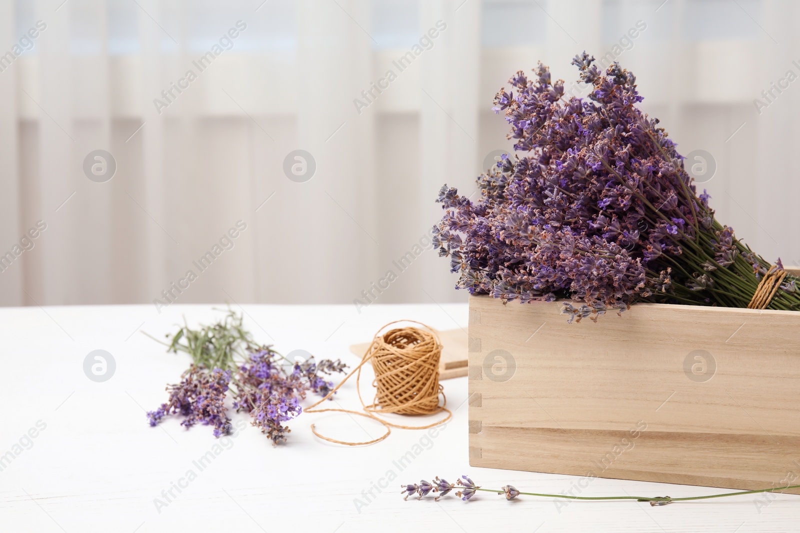 Photo of Composition with blooming lavender flowers on table