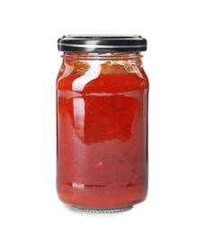 Photo of Tasty homemade tomato sauce in glass jar on white background