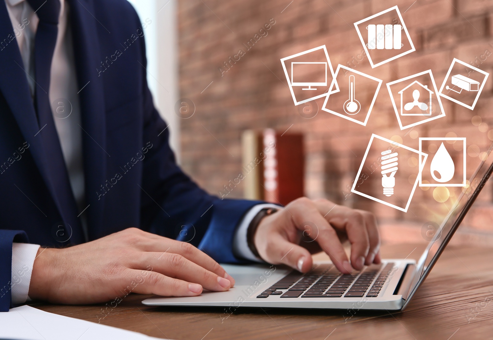 Image of Man using laptop to control smart home, closeup. Automatic systems