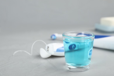 Photo of Set of oral care products on light table. Teeth hygiene