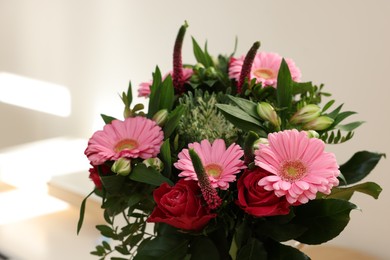 Bouquet of beautiful flowers on blurred background, closeup