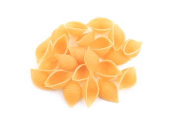 Photo of Pile of raw conchiglie pasta isolated on white, top view