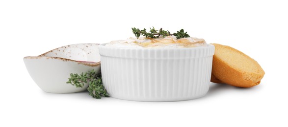 Photo of Tasty baked camembert and thyme in bowl isolated on white
