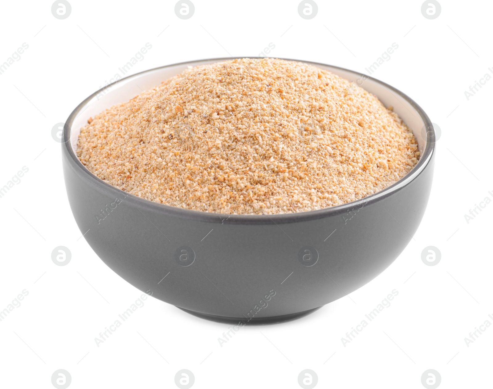 Photo of Fresh bread crumbs in bowl isolated on white