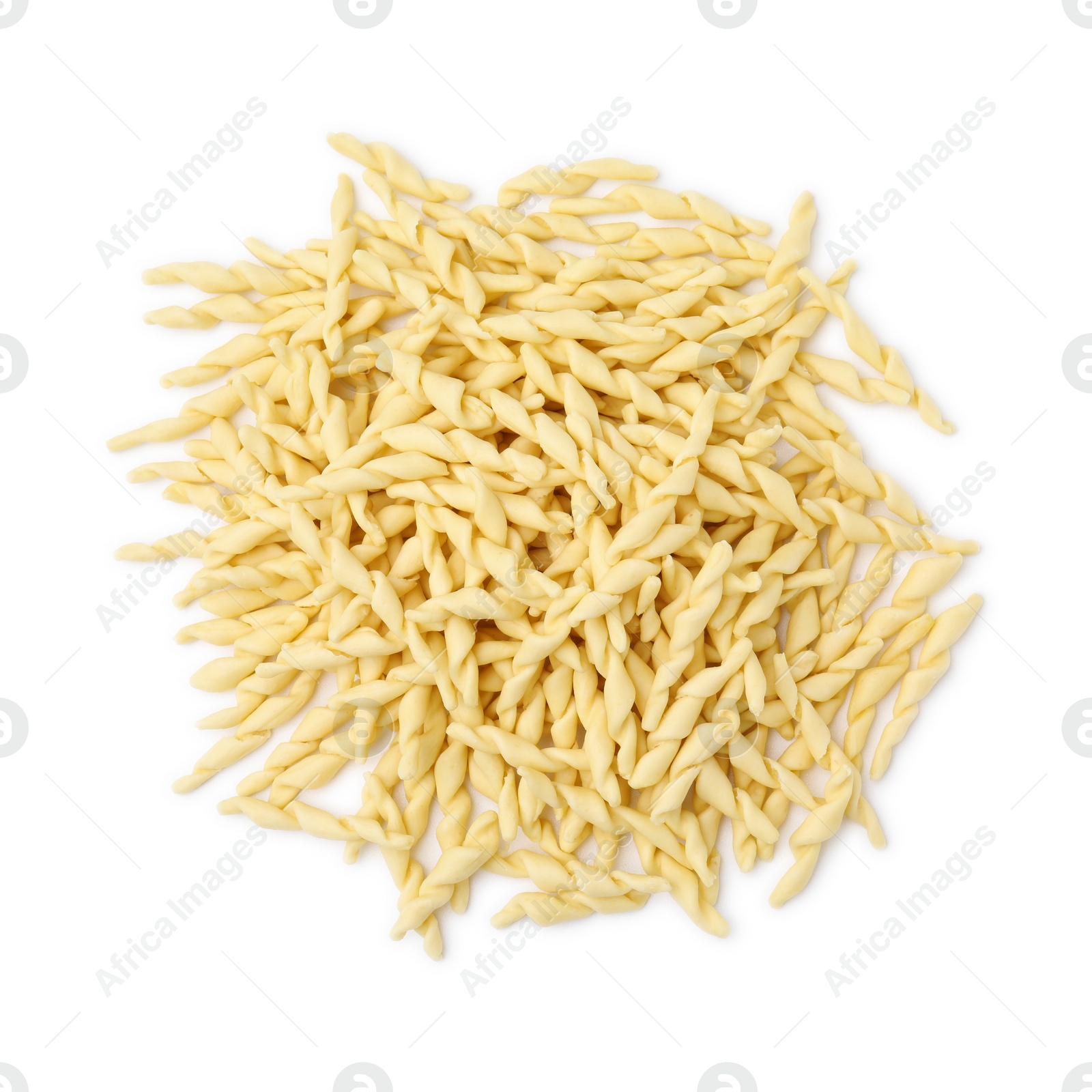 Photo of Pile of uncooked trofie pasta isolated on white, top view