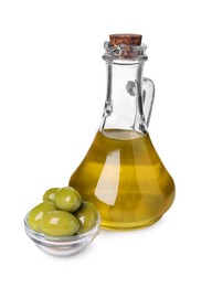 Glass jug of cooking oil and ripe olives isolated on white