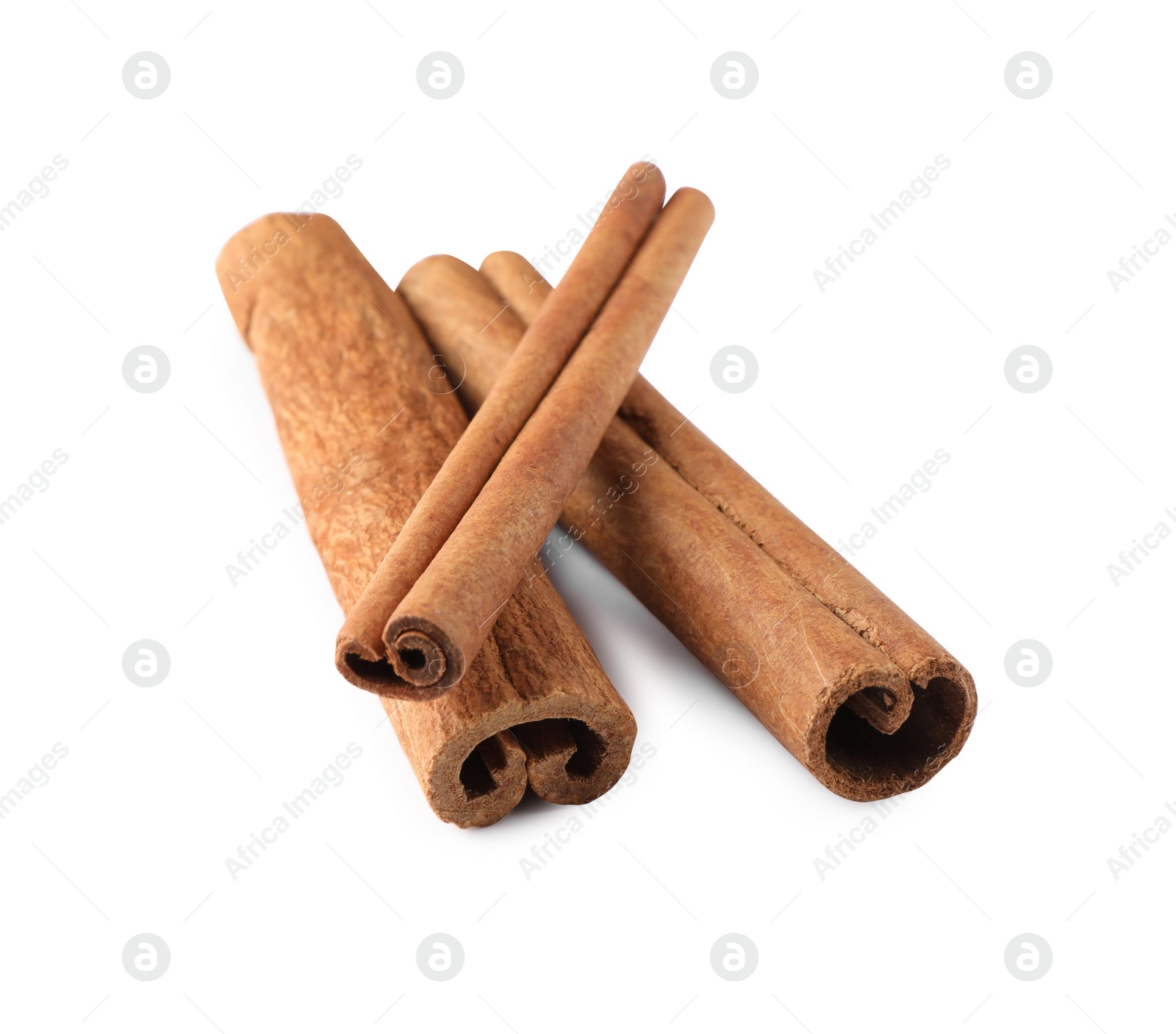 Photo of Three aromatic cinnamon sticks isolated on white