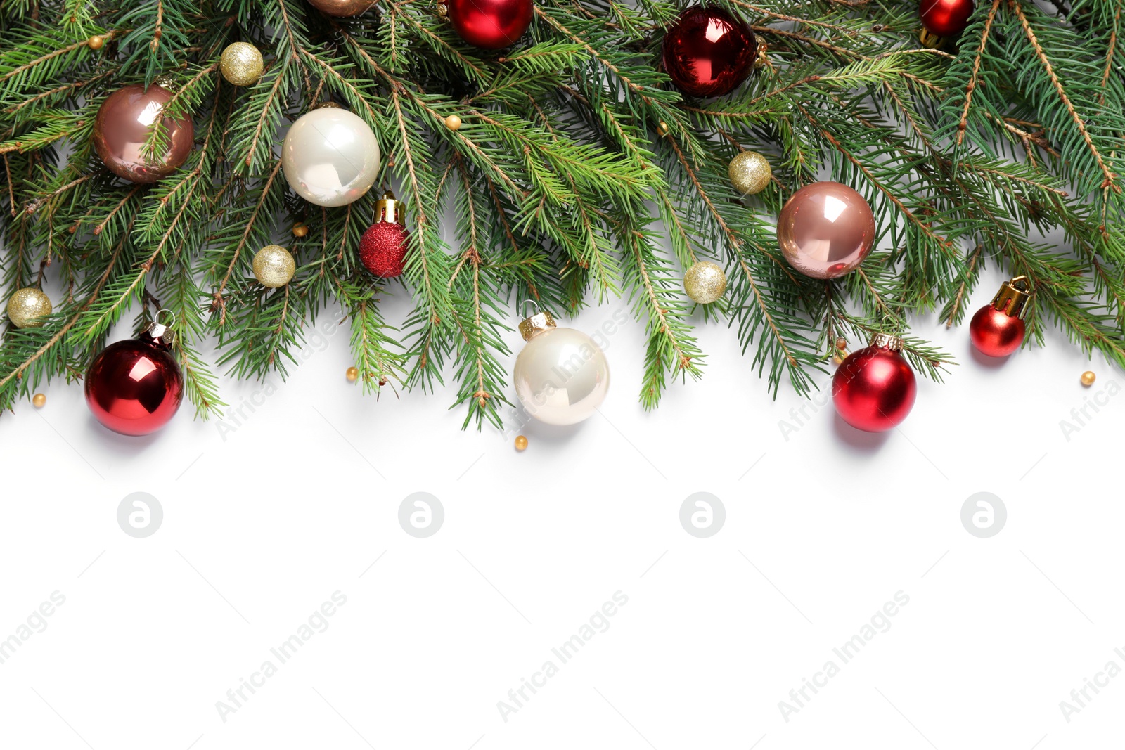 Photo of Fir branches with Christmas decorations on white background, flat lay