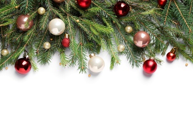 Fir branches with Christmas decorations on white background, flat lay