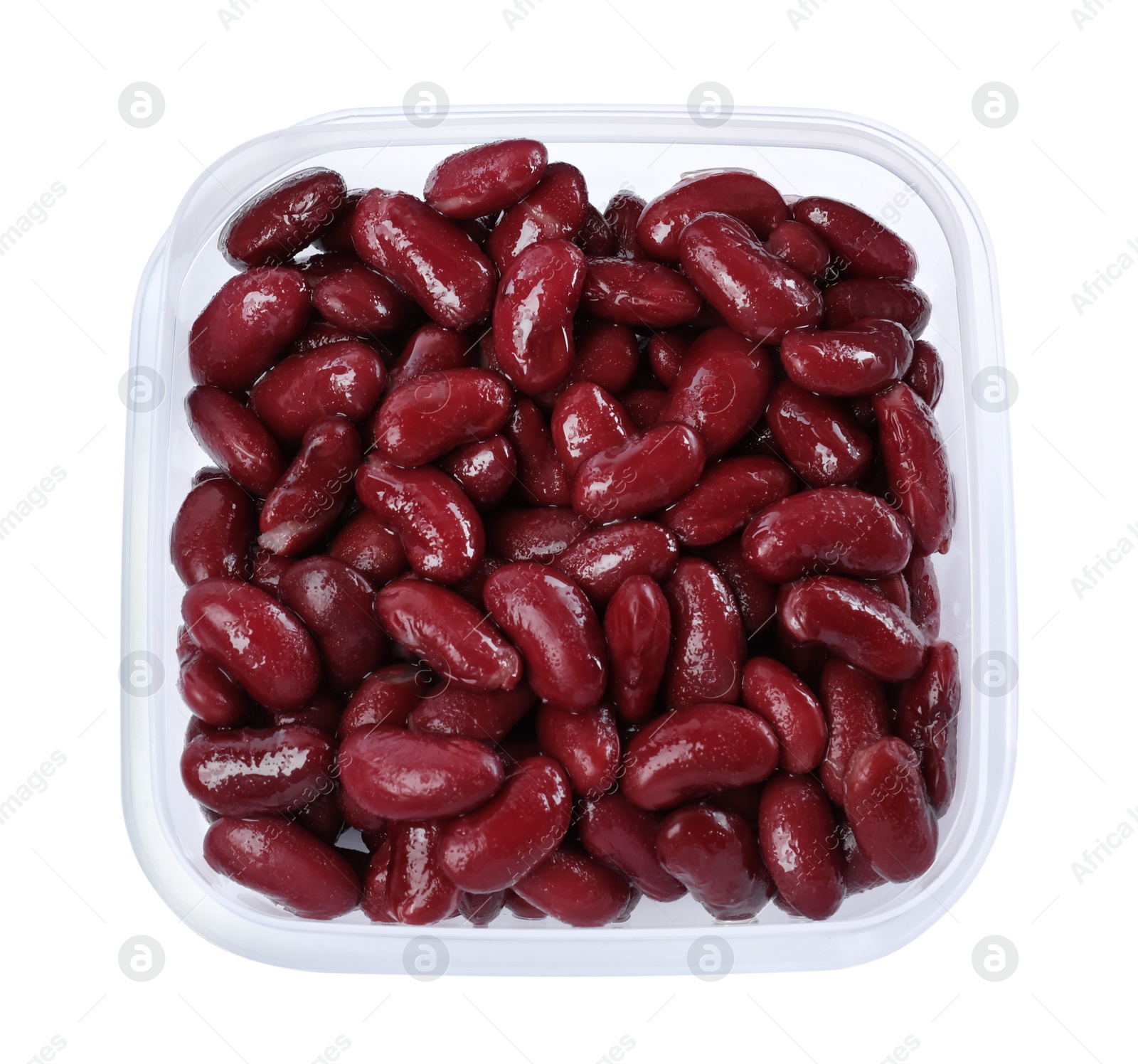 Photo of Fresh red kidney beans in plastic container isolated on white, top view