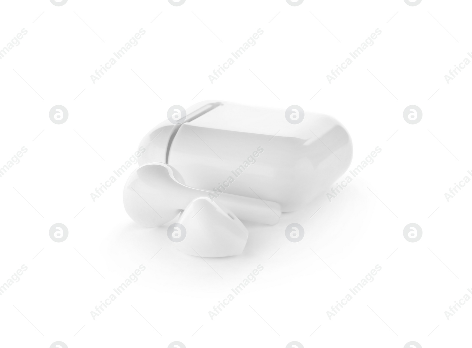 Photo of Modern wireless earphones and charging case on white background