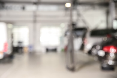 Blurred view of modern automobile repair shop