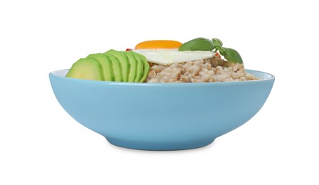 Photo of Delicious boiled oatmeal with fried egg and avocado in bowl isolated on white