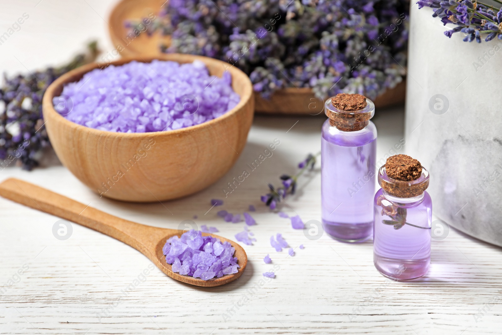 Photo of Composition with natural cosmetic products and lavender flowers on white wooden background