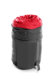 Photo of Rolled sleeping bag on white background. Camping equipment