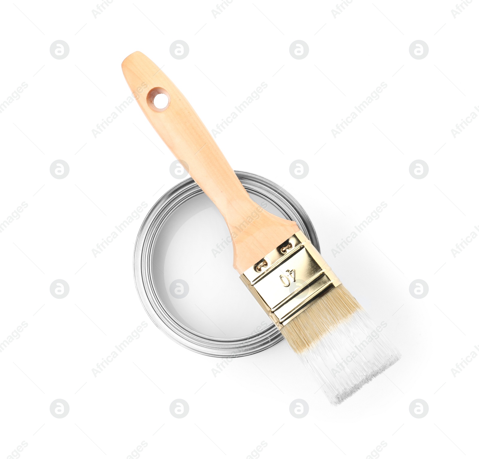 Photo of Paint can with brush on white background, top view