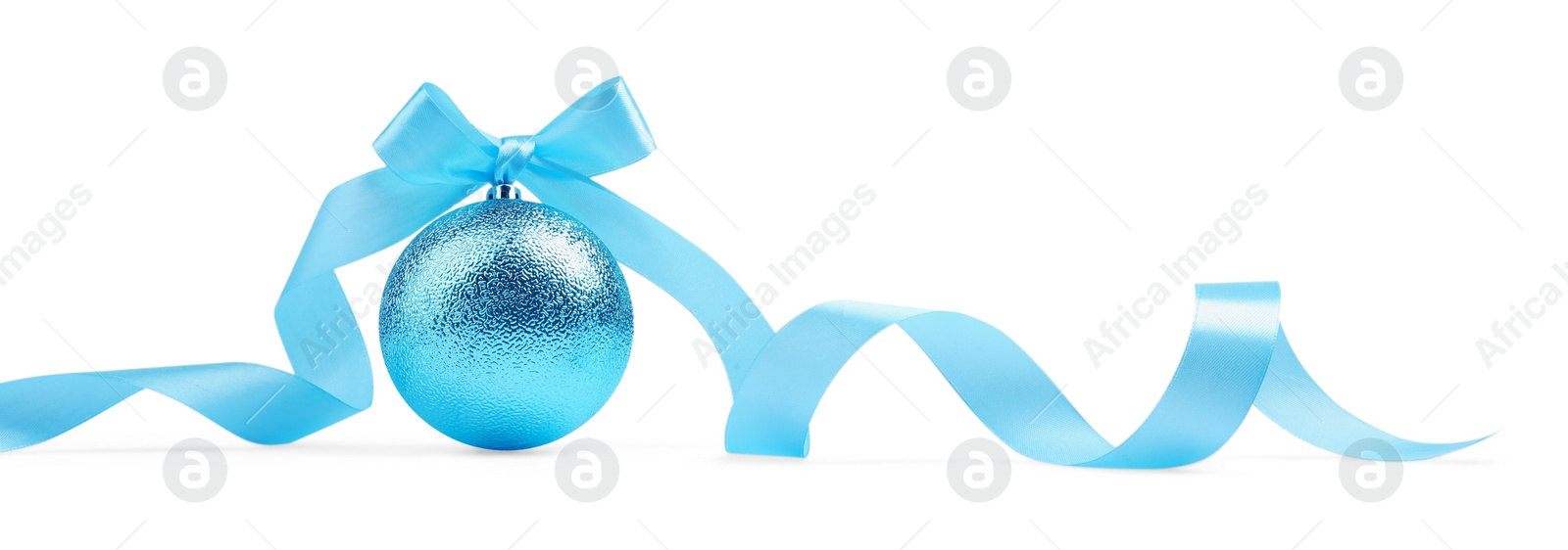 Photo of Beautiful light blue Christmas ball with ribbon isolated on white