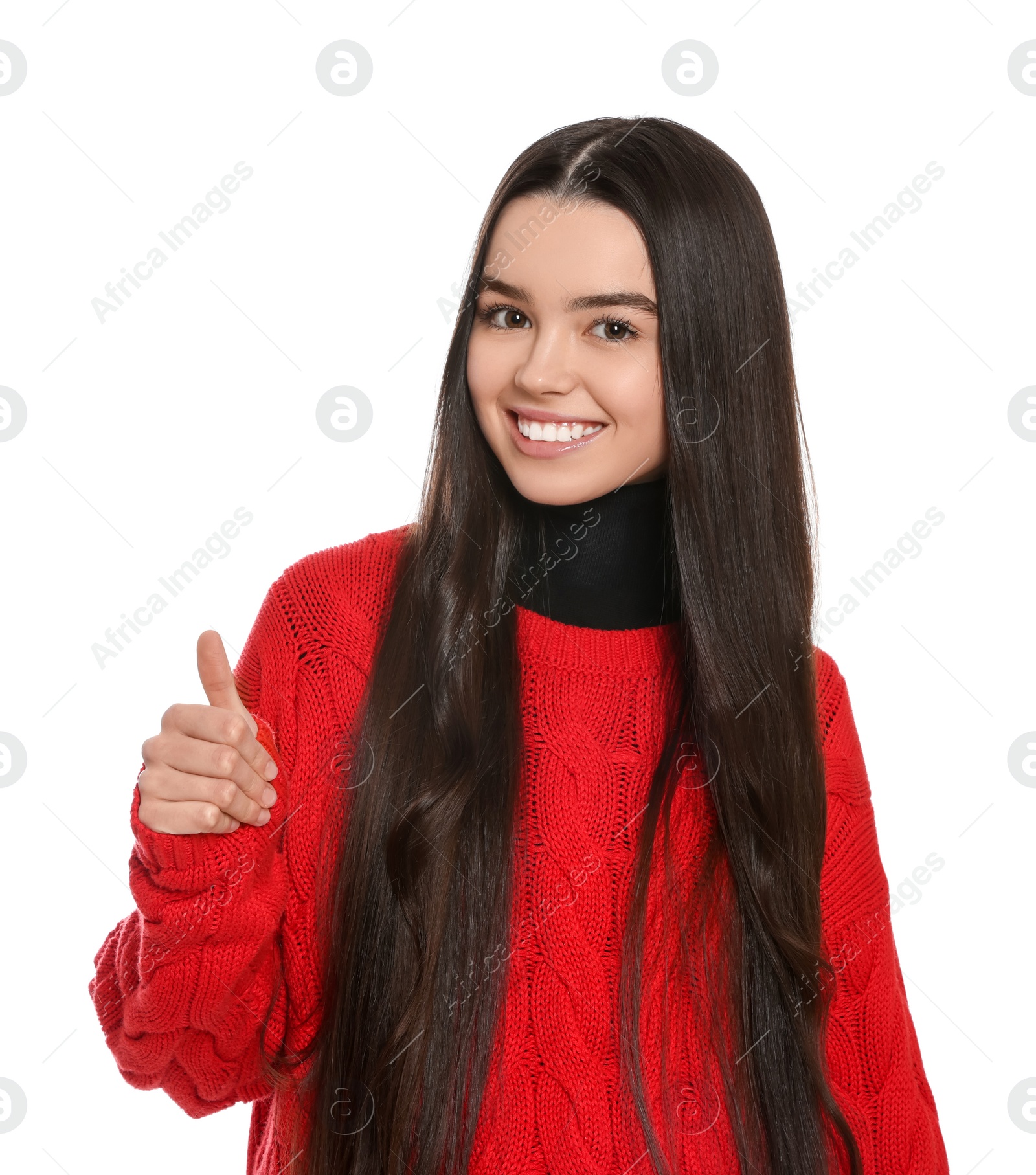 Photo of Teenage girl showing thumb up on white background