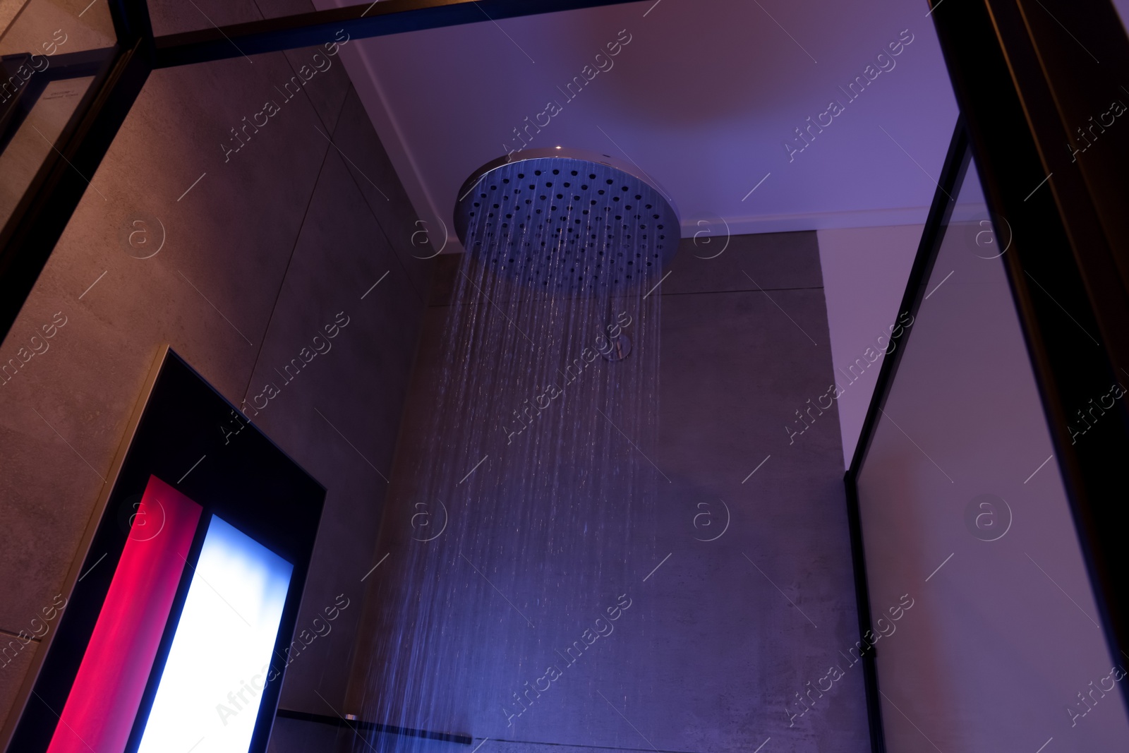 Photo of Modern shower with Infrared spectrum, UV light and flowing water