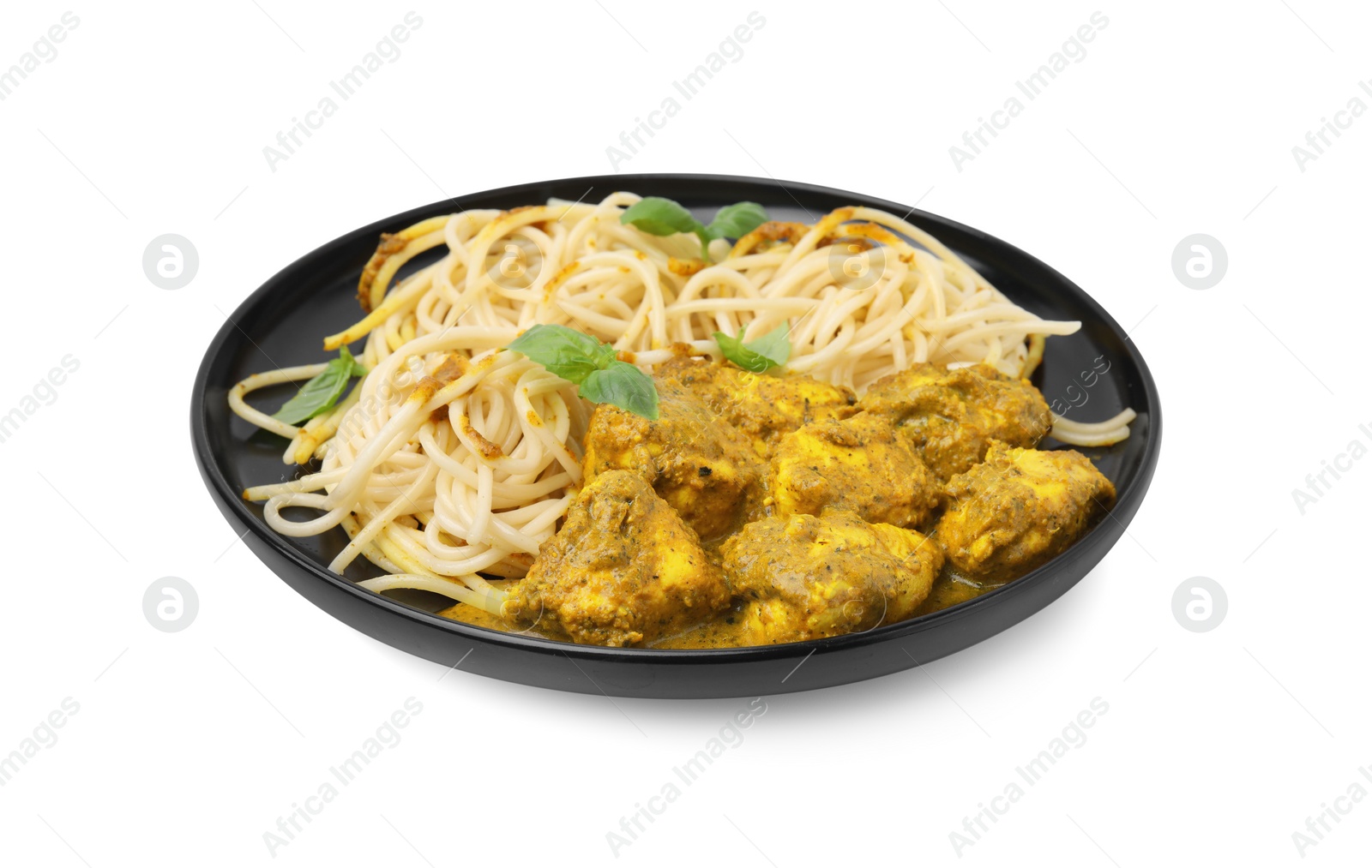 Photo of Delicious pasta and chicken with curry sauce isolated on white