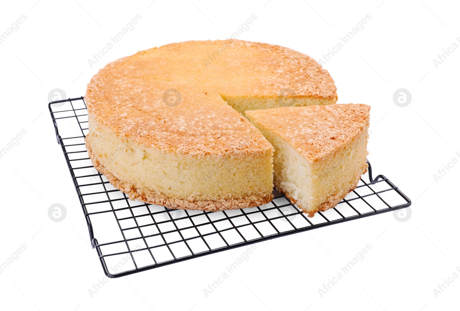 Photo of Baking rack with tasty sponge cake isolated on white
