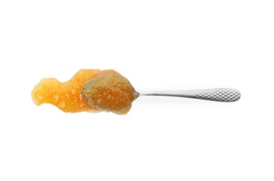 Photo of Delicious orange marmalade and spoon on white background, top view