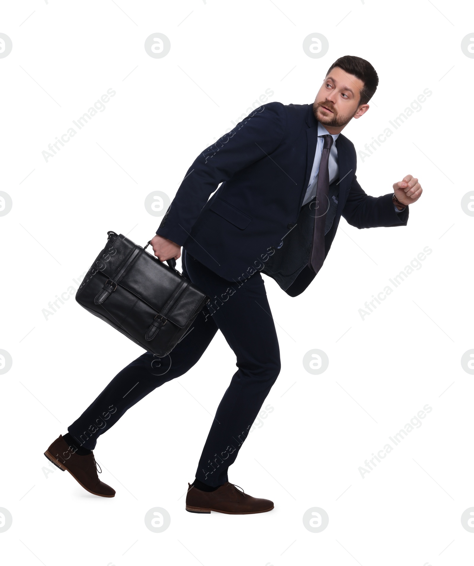 Photo of Handsome bearded businessman in suit with briefcase on white background