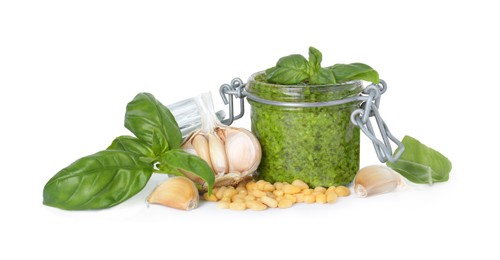 Photo of Delicious pesto sauce in jar and ingredients isolated on white