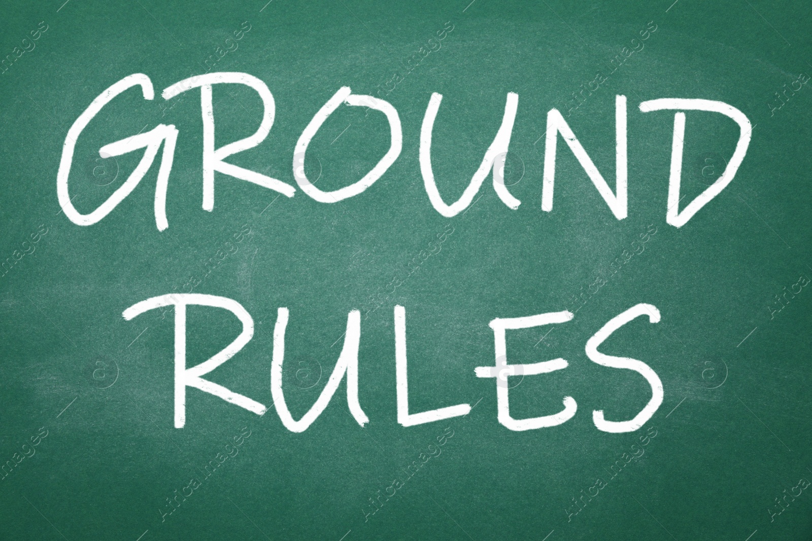 Image of Text GROUND RULES written on green chalkboard