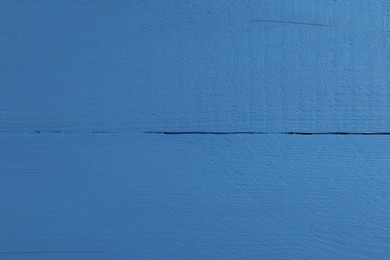 Texture of blue wooden surface as background, closeup
