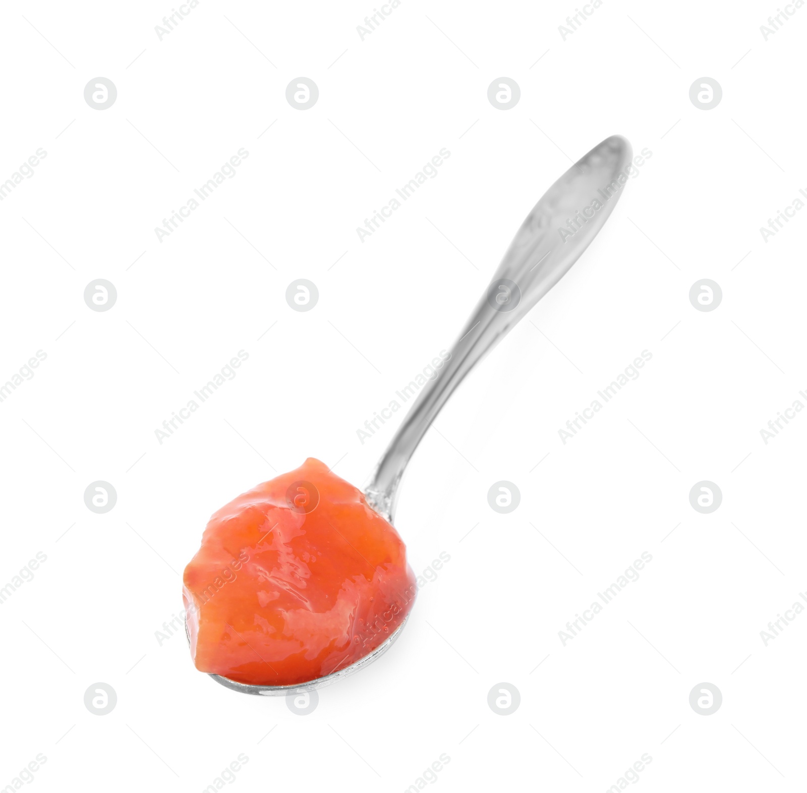 Photo of Spoon with tasty persimmon jam isolated on white