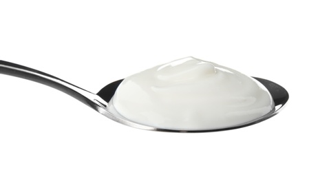 Photo of Spoon with creamy yogurt on white background, closeup